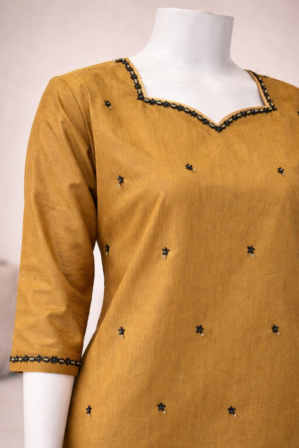 Mustard raw silk embellished suit front view with straight cut silhouette