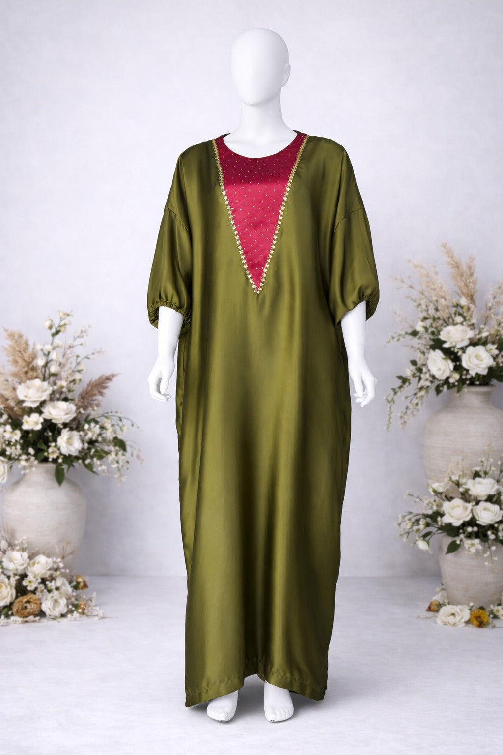 Olive green satin silk kaftan front view on mannequin