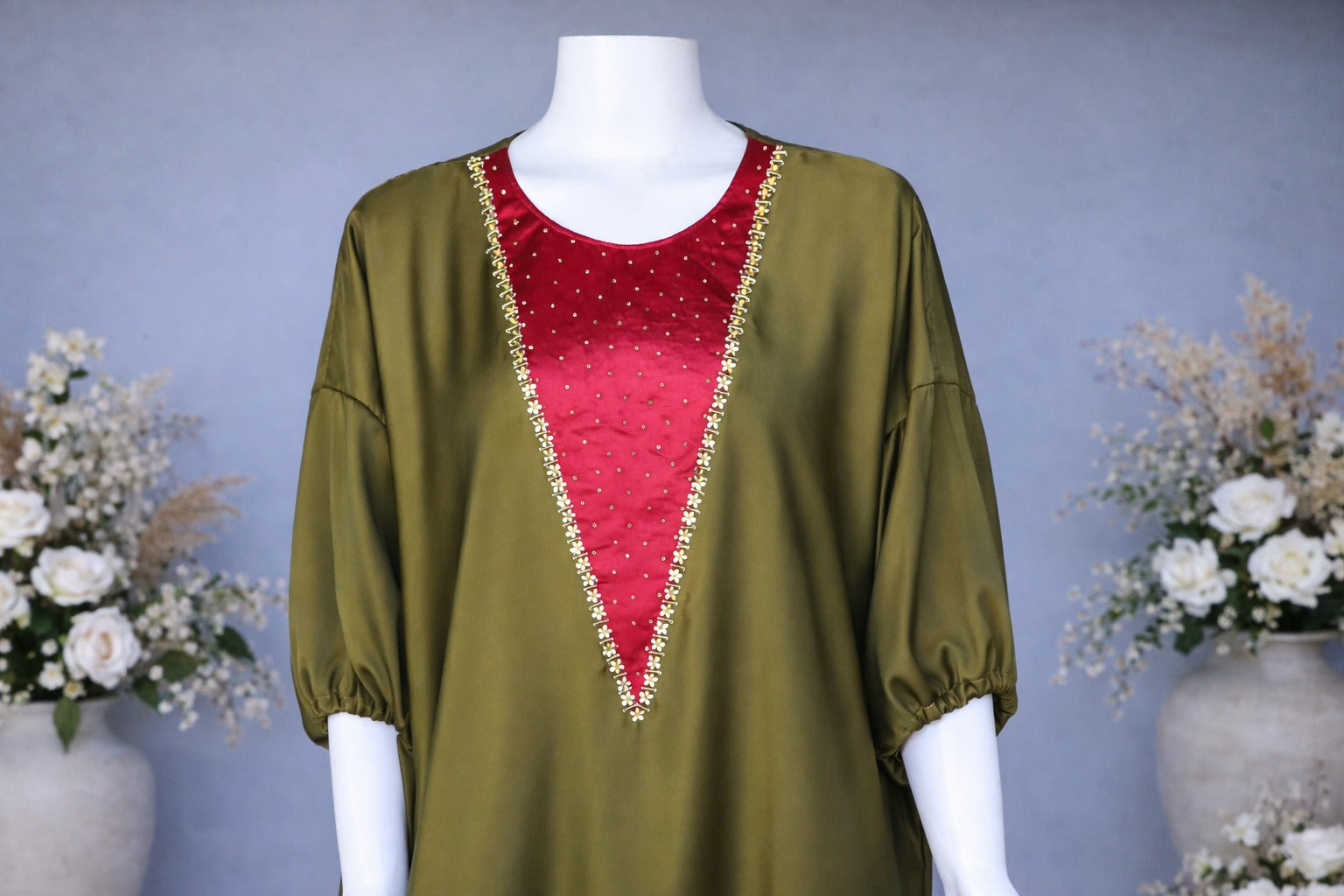 Red embellished neckline detail of satin silk kaftan