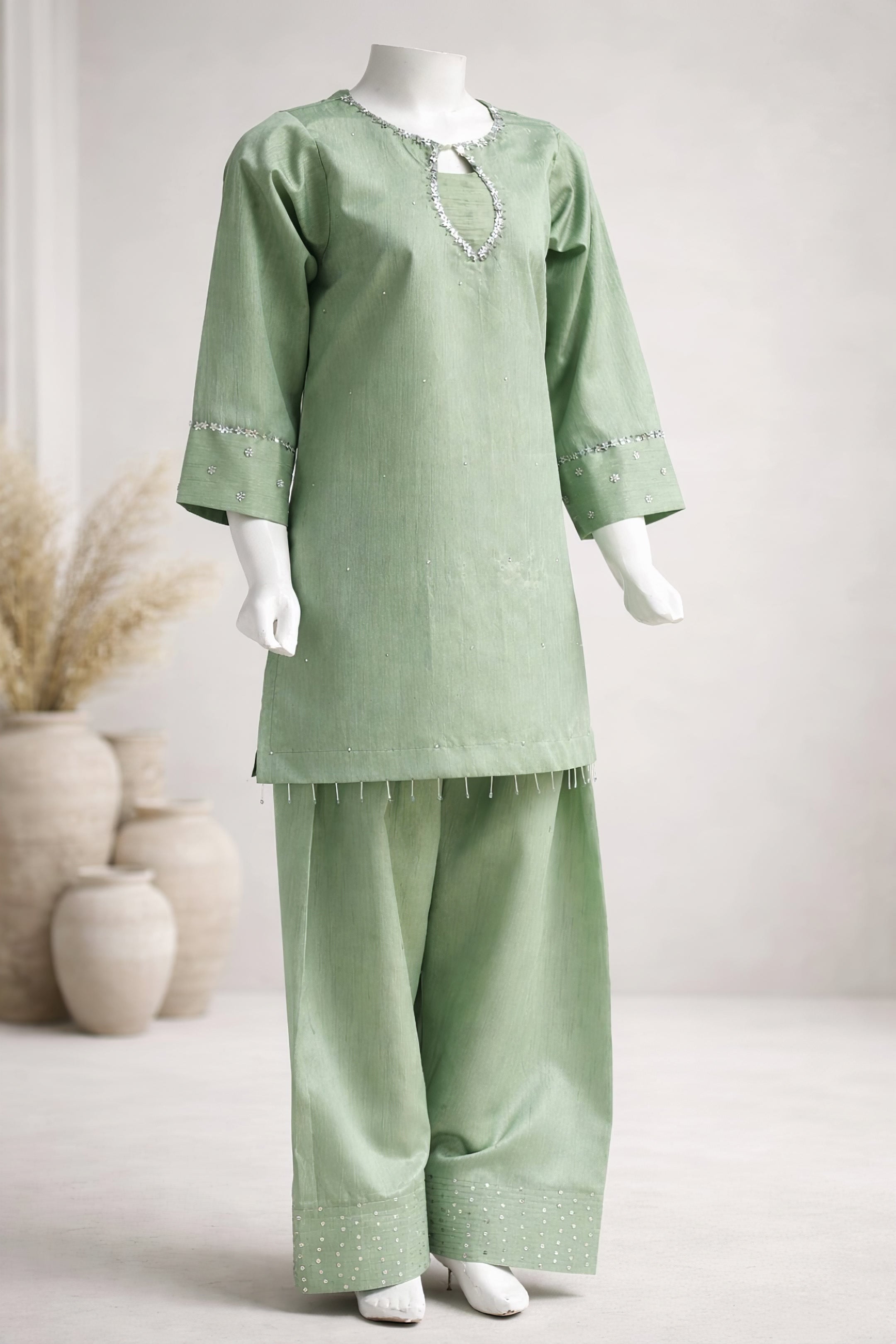 Mint green silk farshi shalwar with straight kurta for festive wear

